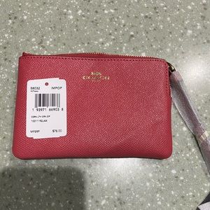Coach corner zip wristlet in Poppy color